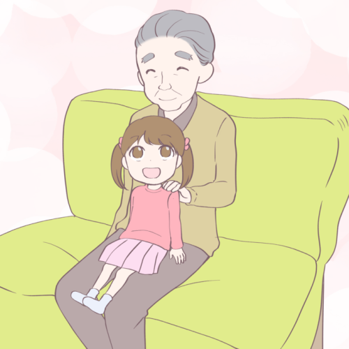 ソファに座るおじいちゃんと女の子